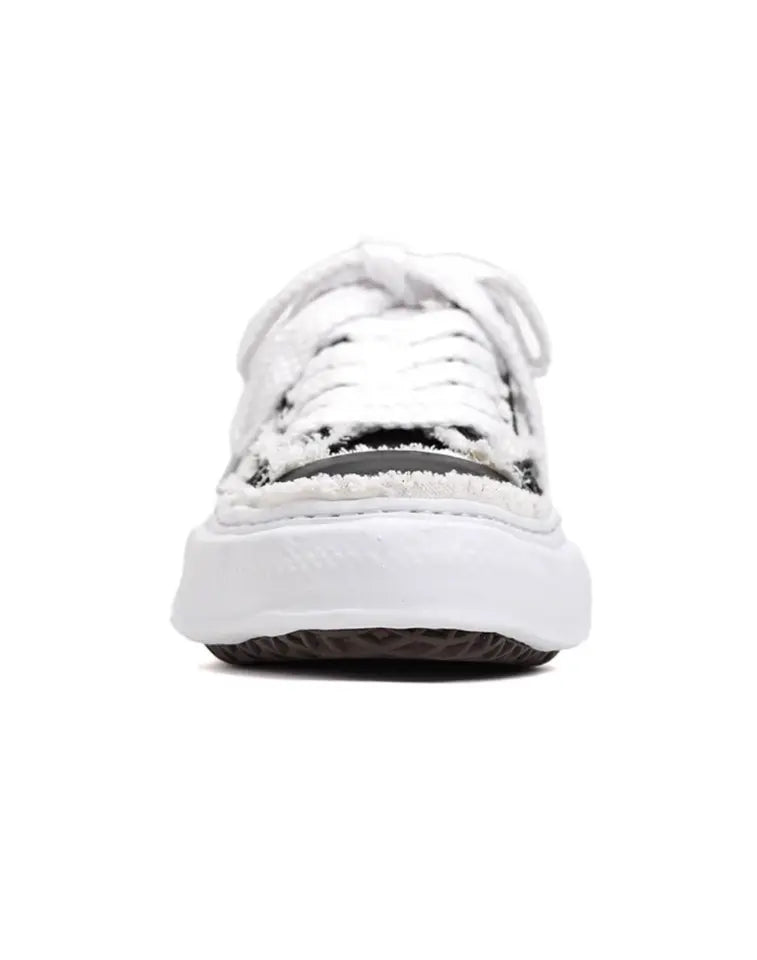 “Flared Peterson” low-top sneakers