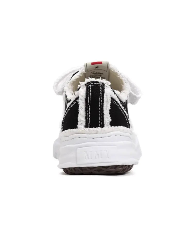 “Flared Peterson” low-top sneakers