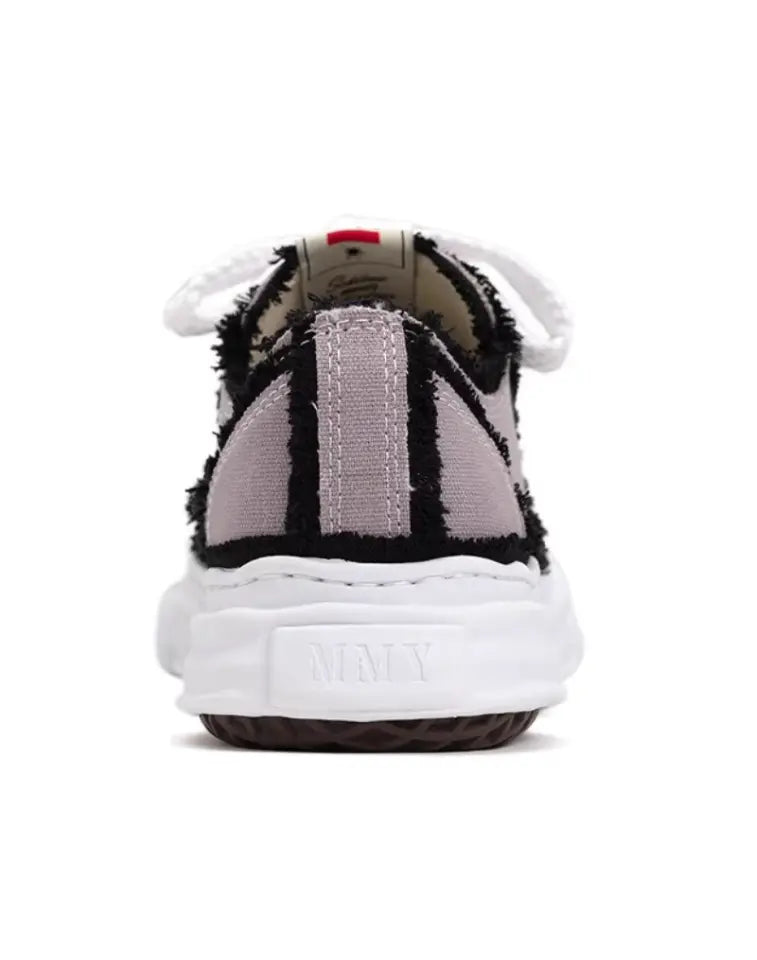 “Flared Peterson” low-top sneakers